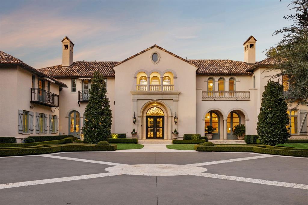 Situated in prestigious Old Preston Hollow, this gated magnificent estate epitomizes luxury & sophistication, sprawling across a private 1.179-acre lot. Six ensuite bedrooms & a total of seven full & four half bathrooms, every inch of this home is crafted for comfort & elegance. As you enter, a grand foyer greets you, flanked by formal dining & living room, each feat a gas fireplace & French doors that open to the front courtyard. The dining room, complete with a temperature-controlled wine room, connects seamlessly to a butler’s pantry & wet bar, creating a chef's paradise for evenings of refined enjoyment. The wood-paneled library provides a tranquil retreat for work or relaxation, adorned with built-ins & a gas fireplace. A large gallery hallway, with cathedral ceilings & designer wallpaper, leads to French doors opening onto an outdoor terrace, ideal for entertaining. The gourmet kitchen boasts double islands & a Wolf range gas cooktop, Sub-zero Refrigerator Freezer, & walk-in pantry, effortlessly connecting to the breakfast room & home management office. The family room, with its vaulted wood beam ceilings, showcases a grand gas fireplace, surrounded by wood built-ins with windows & French doors that overlook the stunning backyard, filling the room with natural light.

The downstairs right wing includes a guest bedroom and a serene primary suite, feat a cozy gas fireplace and dual bathrooms, each with an oversized walk-in closet. Upstairs, you'll find three additional ensuite bedrooms, a wet bar, media room, craft room, exercise room, & additional utility room.

Outside, the expansive terrace is equipped with a wet bar, built-in grill, & gas fireplace, offering ample space for dining & entertaining. A serene pool & spa are nestled within the lush, manicured backyard, creating a private oasis. This Preston Hollow estate is complete with a private motor court & a 4-car garage, transforming it from a mere residence into a sophisticated lifestyle experience.