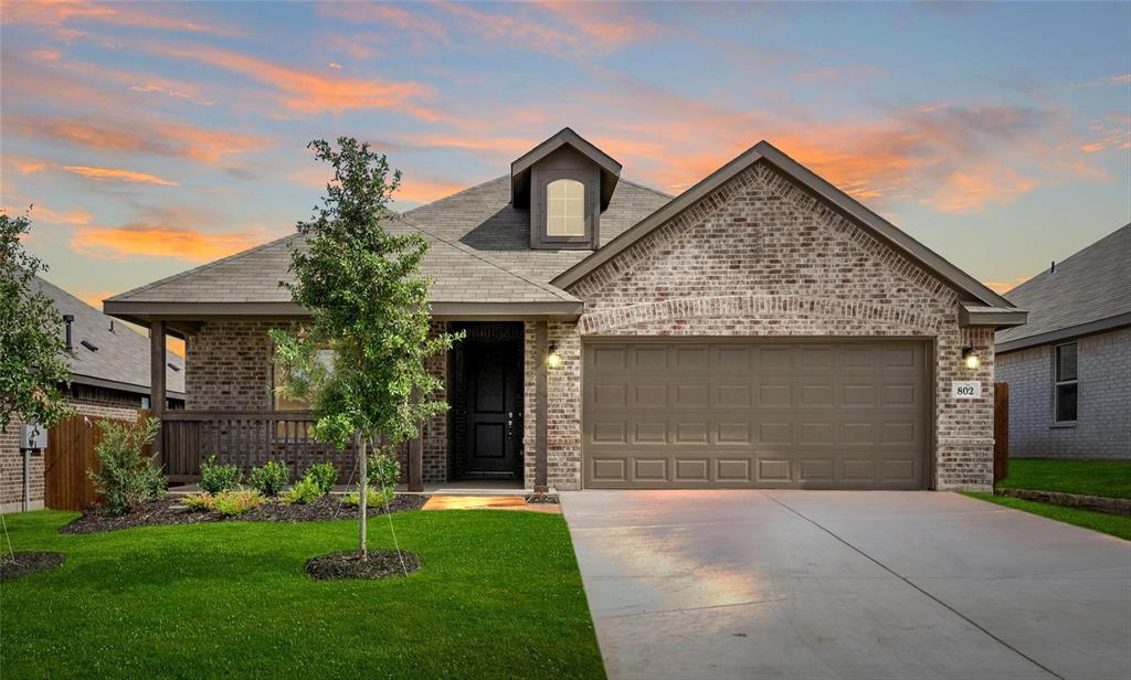 MLS# 20353554 - Built by Antares Homes - Ready Now! ~ -Covered Patio! -Wood Look Tile Flooring! This home combines comfort and simplicity! The designer open-concept kitchen features quartz countertops, stainless steel appliances, beautiful white cabinets, and a breakfast bar that can seat up
 to three people .As you enter the home from the foyer, you can access the two-car garage or continue into the family room. The primary bedroom is secluded and includes a wall of windows and a spacious walk-in closet. Through the double doors, you'll find an adjoined master bath with dual vanity, 
a separate walk-in shower, a linen closet, and a garden tub with a ledge - offering luxury and convenience. This lovely home boasts two bedrooms with linen closets for convenient storage, as well as easy access to a full bath, and a separate utility room with ample space for a full-sized washer and dryer. These fantastic features make this home a true delight!!