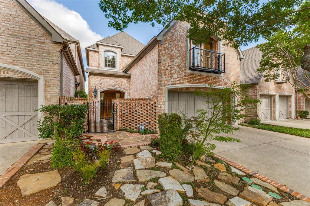 Rarely available waterfront lot in highly sought guard gated Lake Forest! This two-story home offers the perfect blend of location, comfort and privacy. Open concept living-dining-kitchen floor plan with French door to the patio overlooking the serene green space and lake. The living room features a fireplace and built-in shelving and flows seamlessly into the kitchen and breakfast area. The center island kitchen and breakfast area features granite countertops, a gas cooktop, double ovens, and butlers pantry. Step onto the patio through the French doors and enjoy the tree-lined greenbelt and lake with fountains. The charming courtyard offers a peaceful retreat for dining or relaxing. The generously sized primary suite with sitting area overlooking the lake and greenbelt is located upstairs and features a luxurious bath with separate shower and tub, double vanities and a large walk-in closet. This home offers the ultimate in sophisticated living, conveniently located within close proximity to Dallas' best shopping, dining and private school corridor! Lake Forest is comprised of 170 acres of park-like grounds with green spaces, lakes, and towering oaks. Residents enjoy walking trails, community pool, tennis & pickle ball carts, and dog parks.