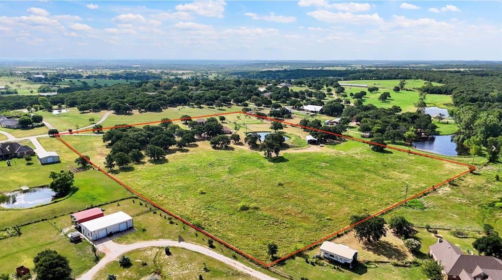 Rare opportunity to own over 10 acres in a highly desirable location with easy access to Chisholm Trail Parkway, shopping, dining, and top-rated schools. This spacious property offers endless potential for buyers seeking room to grow, invest, or create their dream country estate.
The existing home is in need of some TLC and updates, making it an excellent opportunity for investors, renovators, or buyers looking to add their personal touch and build equity. The acreage provides ample space for horses, livestock, workshops, additional structures, recreational use, or future improvements. There is an additional unit made up of 2 bedrooms and 1 bathroom and a kitchen and living area. 
Whether you're looking for a private homestead, a weekend retreat, or a property with long-term potential, this unique acreage offers a rare combination of location, space, and opportunity. Bring your vision and unlock the possibilities this property has to offer.