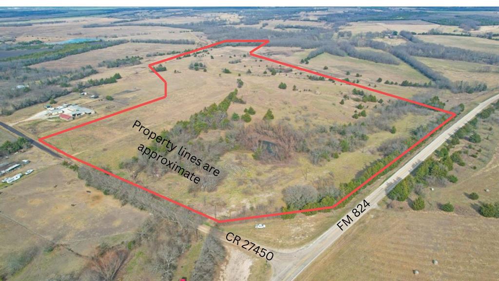 Nice hilltop build site!  57.5 acres with 2 ponds, run a few head of cattle, horses or just enjoy the view. Electric and Water available nearby.
Aerial photo property lines are approximate.