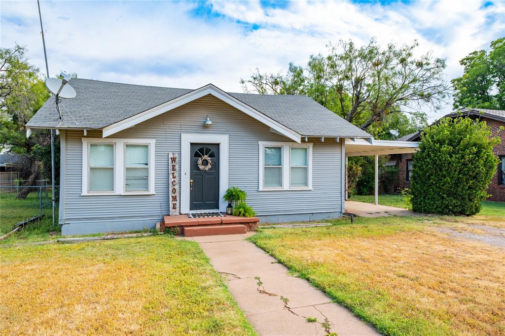 Beautifully remodeled home close to the Jr and Sr high schools. This traditional 1920's home is fresh and unfaded. Updated with newer carpet in the bedrooms, and beautiful refurbished hardwood flooring in the spacious living room. The kitchen has a large window allowing lots of natural light. But wait... the CHA is just a few years old and it has undated gas and sewer lines. Just off the kitchen, in the back of the home, is the primary suite that has Knotty Pine paneling, a wood burning stove, and its own bath. The sunroom in the front of the home is a nice bonus which could make a great office or an additional 4th bedroom. This cozy back yard has a concrete patio, has two storage buildings and is fenced.Call to MAKE THIS MOVE IN READY HOME YOURS!