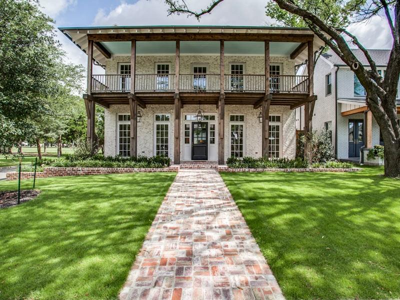 This show-stopper on an over-sized corner lot overlooks Tietze Park with stunning views and high-end finishes everywhere you look. Constructed in 2015 by an award-winning home builder and architect, it underwent a total renovation in 2023.

The main house has wood windows and white oak hardwood floors throughout, 5 bedrooms, each with a private en suite bath, a chef's dream kitchen with Wolf and Subzero appliances and a massive marble island. From formal living and dining spaces to inviting dens and a private home office, each area is impeccable.

The primary bedroom features separate luxurious walk-in closets and spa-like bath, highlighting a marble shower and soaking tub. Upstairs, large French doors open onto a relaxing porch and downstairs to the backyard revealing a picture-perfect pool and a standalone outdoor fireplace, perfect for entertaining. The detached guest quarters above the garage, equipped with a kitchenette and full bath, offer guests comfort and seclusion.