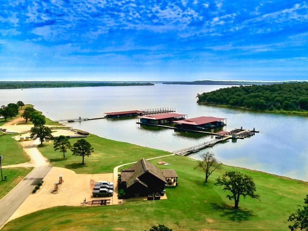 Build your dream home on this .246-acre lot in the sought-after Cabo Del Sol Addition of Rock Creek, Lake Texoma’s premier 1,300-acre master-planned resort community. With no required timeframe to build, you can purchase now and build when you’re ready. Choose your own builder or select from a list of approved custom builders.  Located on the Texas shores of Lake Texoma and just 60 minutes north of Dallas, Rock Creek offers the perfect blend of lakeside tranquility and luxury resort living. Property owners enjoy exclusive access to a top-rated Jack Nicklaus-designed golf course, clubhouse with upscale and casual dining, pro shop, resort villa suites, swimming pool, fitness center, pickleball and tennis courts, marina, ship store with kayak rentals, walking and jogging trails, and more.  Whether you’re looking for a full-time residence, vacation home, or future investment, this lot offers an incredible opportunity to enjoy one of North Texas’ best-kept secrets. Conveniently located within minutes of MegaStar Casino and less than an hour from WinStar World Casino and Resort and Choctaw Casino and Resort, you’ll enjoy easy access to entertainment while still embracing the peaceful resort lifestyle. Tour Rock Creek today and discover why so many never want to leave!