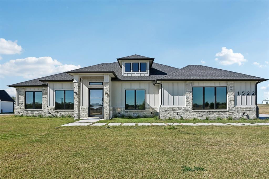 PRICE IMPROVEMENT!!! Luxury 4-Bedroom Home on 1 Acre – Royse City, Community ISD schools!

MOTIVATED SELLERS!! BRING AN OFFER TODAY!! Built in 2024 and barely lived in, this stunning 4-bedroom, 3-bath home offers nearly 2,900 sq ft of modern luxury. Situated on a full acre in Royse City and zoned to Community ISD, it features an open-concept design with soaring ceilings, designer finishes, and natural light throughout. The gourmet kitchen boasts upgraded stainless steel appliances, granite countertops, custom cabinetry, and a large island perfect for entertaining. The spacious primary suite features a spa-like bath with a walk-in shower, a freestanding soaking tub, and dual vanities. Enjoy peaceful country living with easy access to shopping, dining, and major highways. Move-in ready and available to show today! Do not miss out on this opportunity to live the country life away from the city. Easy access to commute to Dallas and far enough away to enjoy a quiet country night.