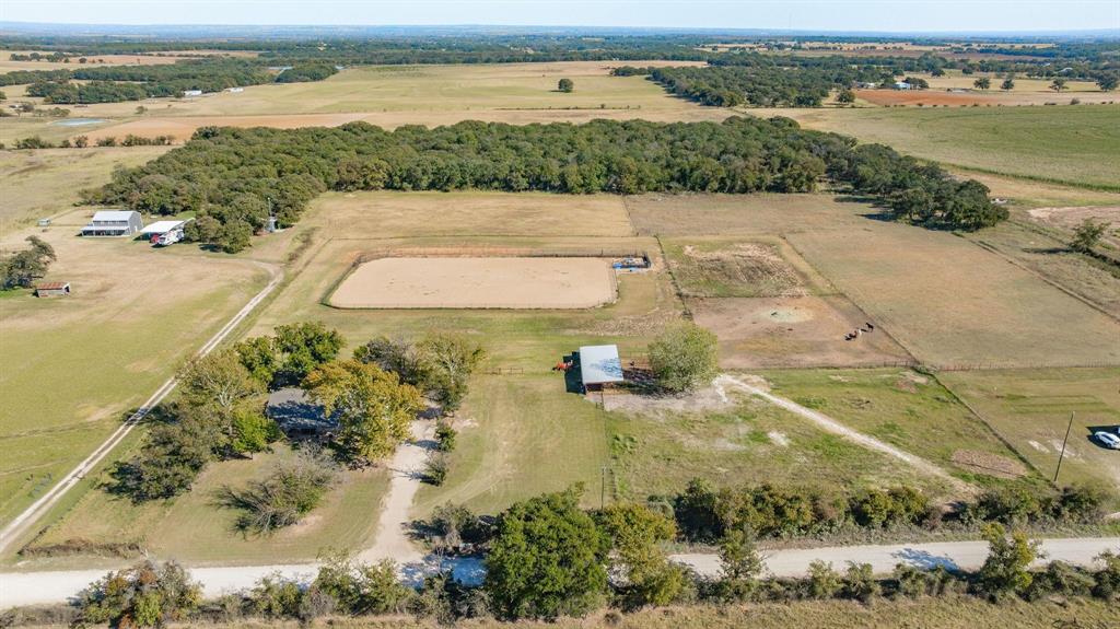 TURN KEY horse property between STEPHENVILLE and COMANCHE Cowboy Capital of the World. 5 STALL BARN, RV HOOK UPS, AG EXEMPT, ARENA PAD AND POTENTIAL!! 
Fully remodeled 4-bed 2-bath home on 6 ag exempt acres offers a rare combination that is hard to find.
With over 1,800 sq. ft. of living space with two spacious living areas, all-new flooring and subfloors, and a cozy wood-burning fireplace that adds warmth and character. The thoughtful floor plan provides flexibility for everyday living, entertaining, or multi-generational use.
The galley-style kitchen is perfectly positioned between both living spaces and has been completely updated with brand-new cabinetry, granite countertops, new sink and dishwasher, updated fixtures, and vents, creating a practical and polished space.
Both bathrooms have been fully remodeled, featuring clean, modern finishes and sleek glass shower doors. Major system upgrades include updated electrical, new windows, new hot water heater, new roof with rain gutters offering long-term piece of mind and potential insurance savings.
Outside, the 6 acres are fully fenced and cross-fenced. Outside well and RV hookup provide added convenience for guests, trailers, or travel rigs. The 5-stall barn is equipped with electric and water and offers direct pasture turnouts.
This is a true turn-key horse property combining extensive home renovations with high-quality outdoor amenities—features that would be costly and time-consuming to replicate today. Whether you’re searching for a functional equestrian setup or a peaceful country retreat outside the Cowboy Capital of the World, this property delivers exceptional value, location, and versatility.