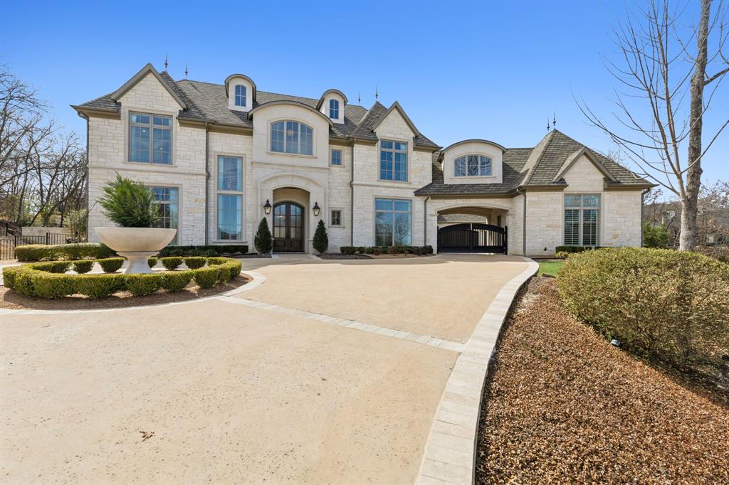 Step into a residence where refined craftsmanship meets effortless elegance in the heart of top-rated Lovejoy ISD. From the moment you enter, soaring ceilings and rich hardwood floors set the stage, leading your eye through the grand foyer and living room to the stunning backyard oasis beyond.

Designed for both everyday comfort and exceptional entertaining, the thoughtfully designed great room seamlessly flows into the dining area and gourmet kitchen, where premium Thermador appliances, quartz countertops, an expansive island with a prep sink, and a large walk-in pantry create a space as functional as it is beautiful. A built-in desk with storage overlooks the garage, while a well-appointed wet bar and media room nearby add to the home’s appeal.

The primary retreat is a true sanctuary, offering serene views of the backyard and a spa-like ensuite featuring a steam shower, freestanding soaking tub, dual vanities, and the option for heated floors. Upstairs, three additional bedrooms are situated around a centrally located game room, accompanied by a climate-controlled storage space and a utility closet for added convenience.

Outside, the resort-style backyard is a masterpiece of design and function. In the evening lit staircase guides you to the elevated cabana, complete with a fireplace and a full outdoor kitchen which is ideal for year-round relaxation and entertaining. The grounds enhance the sense of tranquility, making this a home where indoor and outdoor living blend seamlessly.

From impeccable detailing to a layout designed for both comfort and style, this residence offers a truly exceptional living experience.
Please see attached  video walkthrough.