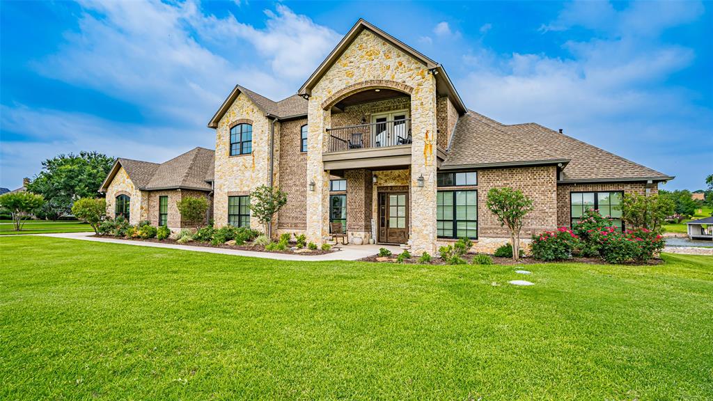 Open, Light & Comfortably Elegant describes this custom waterfront home on Lake Granbury. Enjoy the best in this gated community. This home features soaring ceilings, 8’ interior doors, 5 bedrooms, 5 baths, 2 living & 2 dining areas. Separate office, media room, large outdoor living area with gas fireplace, full 3 car garage plus golf cart space, boat dock with slip, 2 jet ski lifts. Too many amenities to list and just minutes from the Historic downtown square.