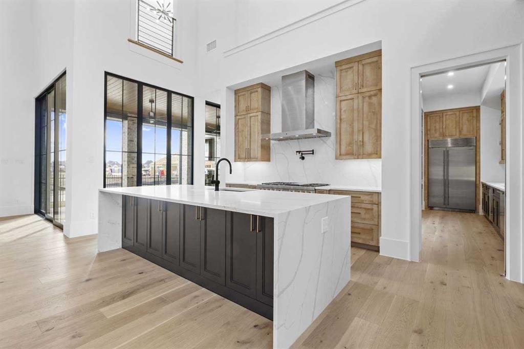 MLS# 20977536 - Built by Huntington Homes - April completion! ~ Lennox floorplan on great corner homesite. New French Eclectic elevation w painted brick. Extensive windows & 10 high sliders welcome in an abundance of natural light. Volume ceilings thruout. Great room is open to gourmet kitchen w Wolf & Subzero appliances, Quartzite tops, custom high end cabinets. Prep kitchen is perfect for preparing meals w icemaker, 2nd Subzero fridge, microwave & 3rd oven. Primary bath has huge shower & freestanding tub along w custom closet system. Private study w pwdr bath to work undisturbed. All en-suite bedrooms for privacy. Game room has wet bar and is next to insulated media room for movie watching fun. Gigantic outdoor living area has fireplace and outdoor kitchen for entertaining. 3 car side by side garage. FINAL OPPORTUNITIES to own a Huntington Home in Fields! Wont last!!