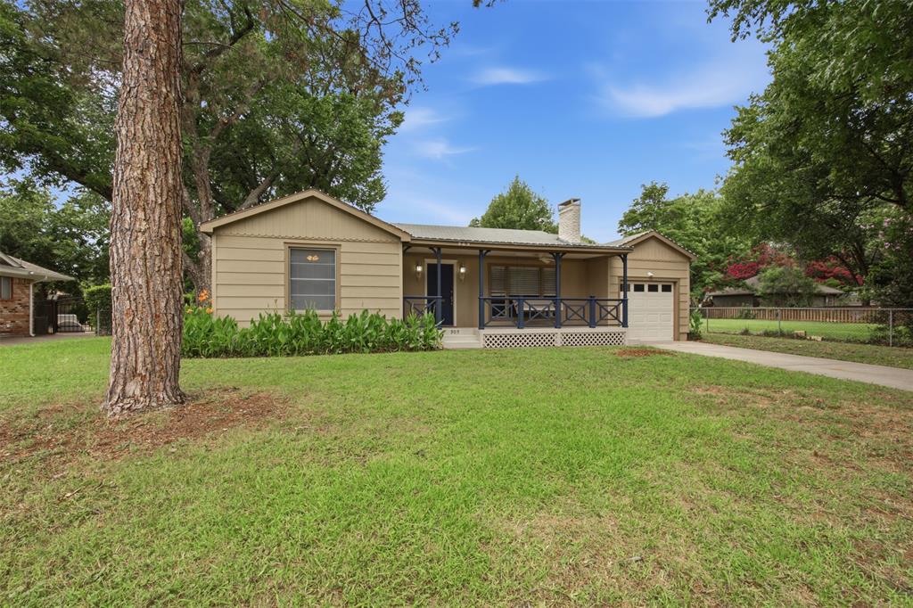 Charming cottage nestled on a beautiful tree-shaded lot in the heart of River Oaks. A welcoming front porch with a swing adds warmth and curb appeal, creating the perfect spot to relax and enjoy the neighborhood. Inside, the updated kitchen features a center island and French doors that open to a spacious, shaded backyard—ideal for entertaining or everyday living.

The bright front living room showcases a wall of windows that fills the space with natural light, along with a cozy fireplace as a focal point. Two generously sized bedrooms and a full bath are tucked away off a private hallway, offering comfort and privacy.

Additional highlights include an attached one-car garage and a large laundry room with ample storage space. This delightful home combines character, functionality, and an exceptional location in one inviting package.