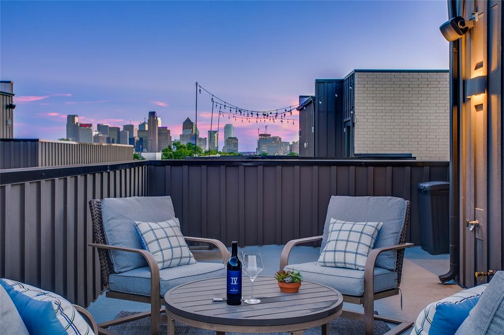 Tucked away in a vibrant pocket of Dallas near the upcoming Henderson development, this contemporary, gated residence offers a functional layout with three bedrooms, three and a half bathrooms, and breathtaking views from the private rooftop.

The first floor features a welcoming foyer, a bedroom with a private ensuite bathroom, and access to the two-car garage with an electric charger. Upstairs, the open-concept living area has high ceilings, hardwood flooring throughout, and integrated surround sound. The kitchen is equipped with Bosch appliances, streamlined cabinetry, and a generous island. This space flows into the living area, which includes a dining space, sliding door to a balcony, and custom blinds installed on the windows.

The primary suite features an ensuite bathroom with a glass-enclosed shower, dual vanities, and an oversized closet. A secondary bedroom down the hallway can be used as a guest room, home office, or gym.

Perhaps the crowning jewel is the outdoor living space. Step out onto the private rooftop deck to take in the breeze and enjoy the views of the Dallas skyline — the ultimate backdrop for sunset drinks or weekend lounging. With its prime location just moments from the best dining, boutique shopping, and entertainment Dallas has to offer, this home isn’t just a place to live; it’s your gateway to the very best of the city. Don’t miss the chance to make this masterpiece your own.