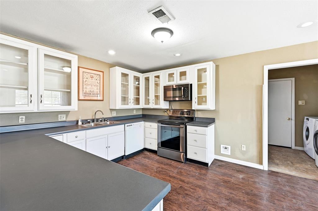 If you’re looking for a home that’s only minutes from the lake, look no further! This property offers a convenient location, right off of 289 and conveniently located across the street from shopping and restaurants. This home in Simmons Shores, also offers access to amenities such as the playground, swimming pool and barbecue grill, with boat access entry available. The home has three spacious bedrooms and two bathrooms with a nice sized living room with wood-burning fireplace and a vaulted ceiling with a stylish wood beam. The kitchen is large, with lots of cabinet space and a walk-in pantry. Enjoy all the appliances, even including washer and dryer. There’s a large two car garage, long enough to keep a boat on a trailer. This unique, large lot sits on a peninsula at the entrance of the neighborhood, so you have no neighbors on either side or behind you! Take a look today and get ready to start living the Lake life! The seller is open to owner financing.