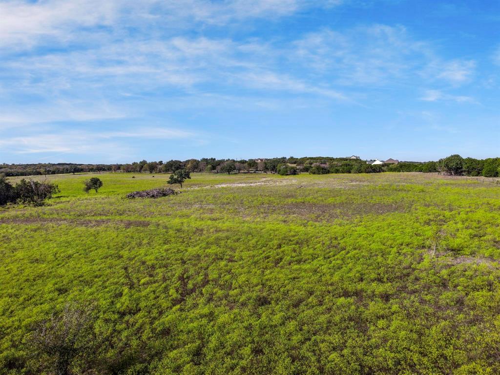 Located in the Azle ISD and just minutes from Dove Ridge Winery, this beautiful 11-acre property off Tucker Drive in offers unparalleled privacy and natural beauty. Perfect for horse lovers or anyone seeking a serene lifestyle, this ag-exempt land provides ample space and freedom.

A gated cul-de-sac is set to be built, featuring just three homes sharing a common entrance, ensuring a private and exclusive community. The land has recently been replatted and is ready for your dream home.

Seller Conditions: To maintain a high standard of construction and preserve the value of the three residences, the seller reserves the right to build the home on the purchased property. Additionally, the seller is offering a 10% discount off the listing price with a build job contract for the new owner.

Don’t miss this incredible opportunity to own a piece of peaceful Texas countryside, just a short drive from Fort Worth!