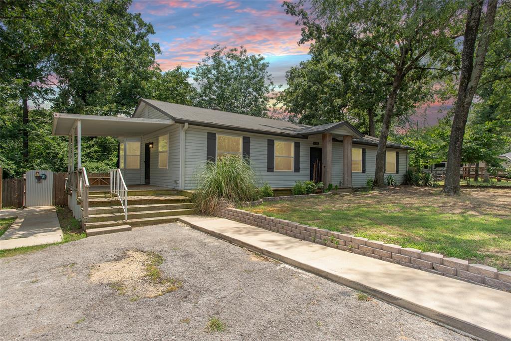 Welcome to 630 Cedarcrest Drive in Tool, Texas, where comfort, space and easy Cedar Creek Lake area living come together beautifully. This inviting 3 bedroom, 2 bath home offers 1,553 square feet, great curb appeal and a large welcoming porch made for slow mornings, sweet tea evenings and a little breathing room at the end of the day.
Inside, you will find an updated kitchen with plenty of cabinet space, a breakfast nook, nice center island, a spacious dining area, and thoughtful updates, including newer light fixtures, ceiling fans, and finishes. The refrigerator and microwave are included making this home even easier to settle into.
Sitting on 3 lots totaling over a third of an acre, this property gives you the kind of outdoor space that lends itself to a variety of options. Plenty of room to store an RV, boat and trailer or any extras you may have. The yard is completely fenced and features an electric gate, room for pets, gardening, or even chickens, plus a hot tub for relaxing under the Texas sky. A detached 2 car garage and separate storage building with electric provide excellent space for parking, hobbies, tools, lake gear or weekend projects.
Located in a good neighborhood with access to a private community boat launch and fishing pier, this home offers the Cedar Creek Lake lifestyle without the waterfront price tag. You are also close to local restaurants, everyday conveniences, and Tool’s new park, The Eight.
Whether you are a first time home buyer looking for room to grow or a retiree ready for a quieter pace near the lake, 630 Cedarcrest Drive offers comfort, charm, and practical space in one of the most loved lake communities in East Texas.