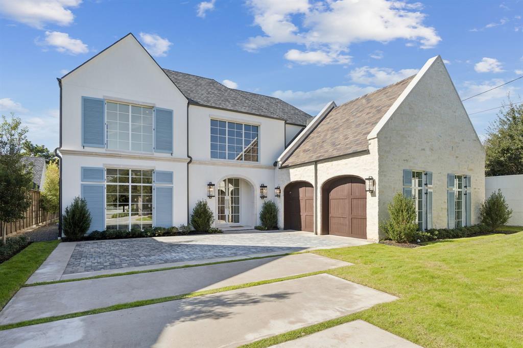 Discover refined living in this exceptional new construction by Platinum Series Homes by Mark Molthan, nestled within the exclusive gated enclave of The Bluffs at Cochran Chapel. Thoughtfully designed with timeless elegance and luxurious finishes. The expansive layout features a large open dining area seamlessly connected to the bespoke chef’s kitchen and inviting family room—perfect for entertaining. The kitchen is outfitted with premium Sub-Zero and Wolf appliances, striking marble countertops, and custom cabinetry that blends beauty with functionality. A posh wet bar anchors the sun-drenched sunroom, complete with a double-sided fireplace and panoramic views of the spacious backyard. The oversized two-car garage provides ample storage and convenience. The first-floor Primary Suite offers a tranquil retreat with a spa-inspired bath and generous walk-in closet. An additional Guest Room and a spacious Study are also located on the main level for flexible living options. Elevator Ready!
Upstairs, enjoy a large Game Room, private Guest Suite, and fully equipped Exercise Room—each thoughtfully designed for comfort and versatility.
This is a rare opportunity to own a beautifully curated home in one of Dallas’ most coveted gated communities.