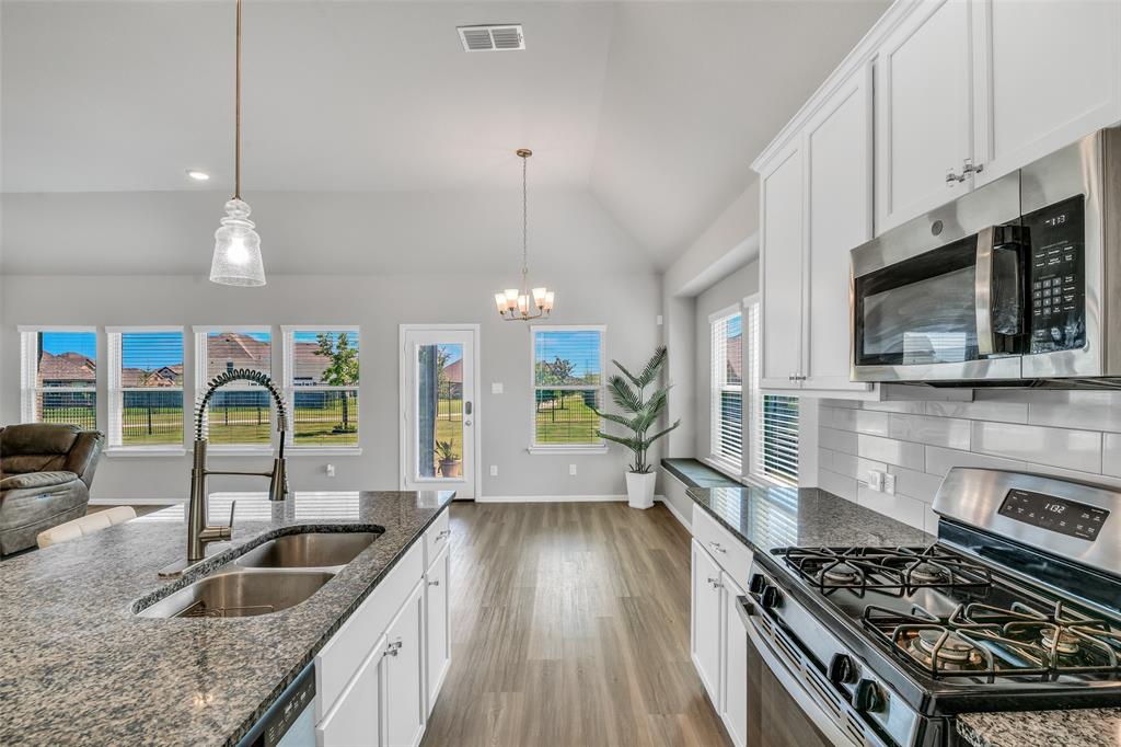 Assumable loan with 2.5% interest rate! (contact your agent or the listing agent for details) Then come for the unique oversized lot, fast growing master planned community with amenities, desirable area and Midlothian ISD. Stay for the beautiful scenery, walks with family and friends, the cul-de-sac with (per the sellers) incredible neighbors! Formerly known as the Prairie Ridge neighborhood and now The Goodland Community, offers an exceptional lifestyle with two resort-style amenity centers featuring pools, a catch-and-release fishing pond, an event lawn, a clubhouse, future fitness center and pickle ball court, dog park, walking trails, and playgrounds. Students will benefit from the future on-site elementary school, making daily routines even more convenient. With easy access to Hwy 287 and 360, you'll be just minutes from an array of shopping and dining options. At Goodland, modern amenities and a prime location come together to create the perfect place to call home. Enjoy a wonderful floor plan with the primary and second bedroom downstairs and three full bathrooms. Greenbelt space to the left of the home makes for a quiet, private, and seemingly larger space to call home. There's a large backyard with room for a private pool. This home is right at a cul-de-sac, across from more greenbelt space and the side of other homes, making it a great space for kids to run, bike, and play. It's an easy commute to DFW airport. And it's also around the corner from accessing the new Goodland Pkwy for easy access to Hwys 287 and 360. Come see!