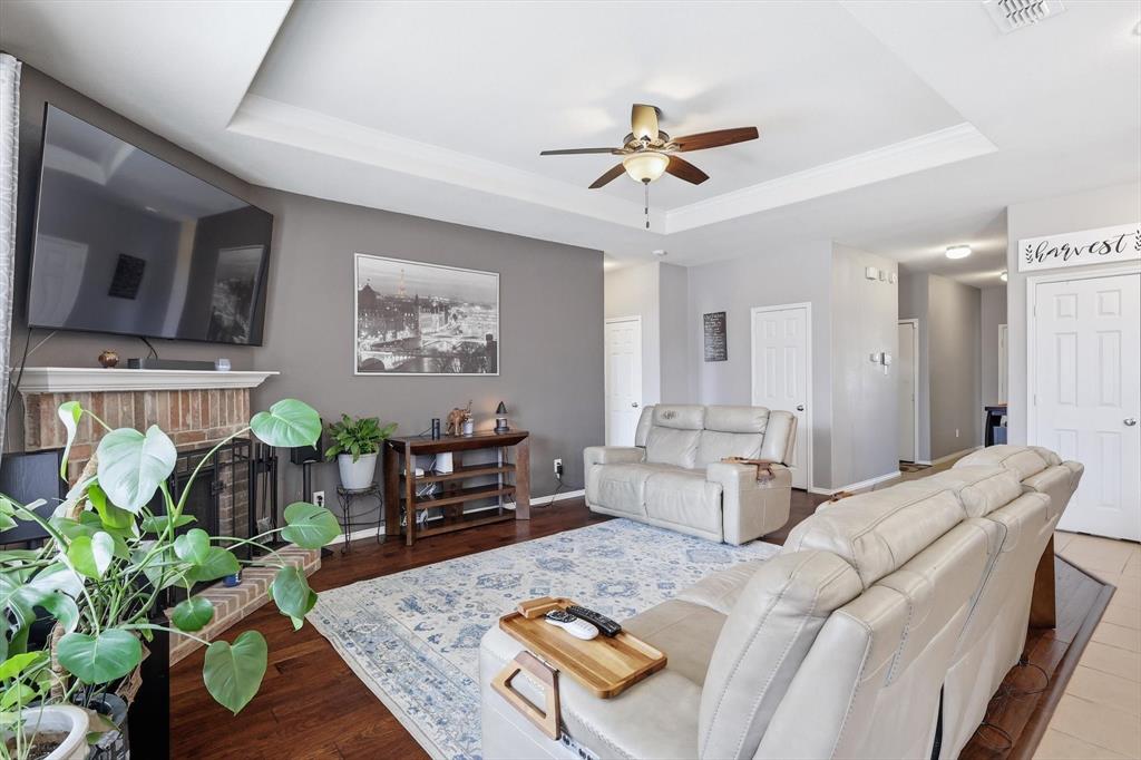 WOW, check out this rare opportunity! One of the best values in Fort Worth's Bar C Ranch community, offering ultimate move-in-ready convenience. This meticulously maintained, NORTH-facing 3-bedroom, 2-bath home combines style, comfort, and accessibility across 1,657 square feet. Lots of love has gone into this thoughtfully updated property, starting with great curb appeal, attractive landscaping, and enhanced exterior lighting.

Inside, you'll find a highly functional floorplan featuring an inviting open-concept layout designed for today's lifestyle. The spacious living area—anchored by a cozy brick fireplace—flows seamlessly into the kitchen and dining spaces, creating the perfect setting for entertaining. Featuring beautiful wood floors in the living room, a large kitchen island, and crisp interior paint, it provides a clean, modern feel from the moment you enter.

Step outside to an expanded patio and a privately wood-fenced backyard offering exceptional outdoor living space—perfect for relaxing, dining, or hosting Texas summer gatherings. Conveniently located within the Eagle Mountain-Saginaw ISD and feeding into Comanche Springs Elementary, plus easy access to local shopping, dining, and major commuter routes. Hurry and come see this one today!