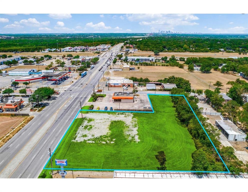 Location, location, location! Do not miss your opportunity to own 1.16 acres of street view property in an extremely high traffic, busy commercial and retail area. This property has so many possibilities as it is steps away from the major traffic of Interstate 20 and quick access to major highways 635, 45, 35, 67, 175 and less than 15 minutes from Downtown Dallas. Current owner has done a beautiful job of maintaining the grounds. Lots of new businesses in the area.