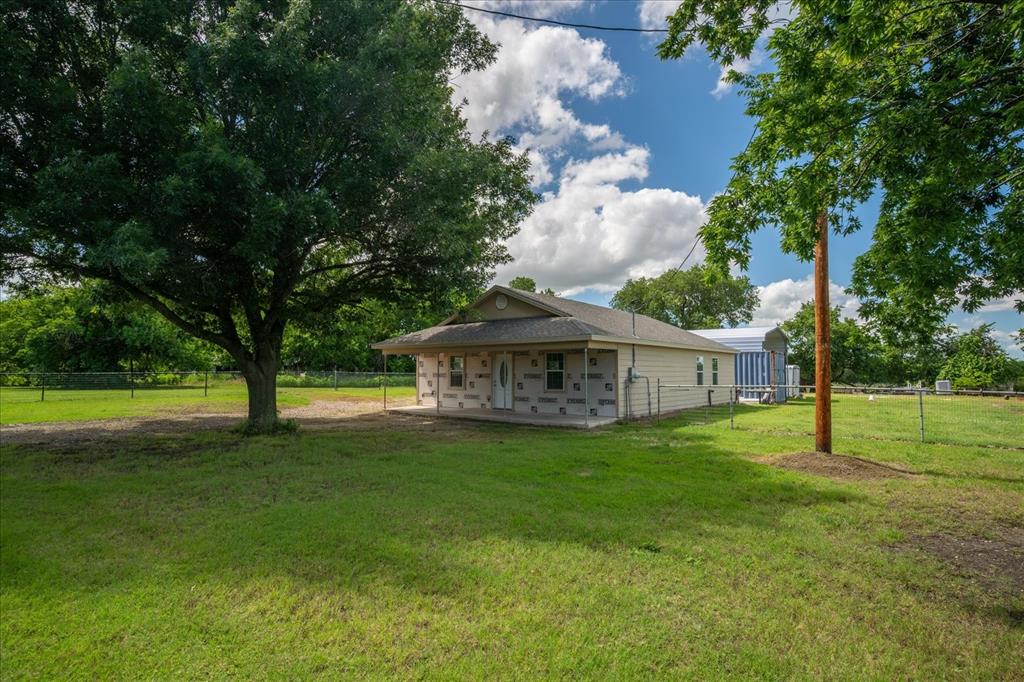 Discover comfortable, efficient living in this well designed 3-bedroom 2 bath home built in 2022. Offering approximately 1200 square feet of living space, this home features a practical floor plan with durable vinyl flooring and carpet. Situated on a manageable city lot in Celeste, this property is ideal for buyers seeking low maintenance living with the benefits of newer construction. The seller is offering flexibility by selling the home as is or completing the front exterior with siding prior to closing, allowing buyers to choose the option that best fits their needs. Whether you are first time buyer, investor, or someone looking to downsize, this affordable newer home presents a great opportunity in a growing small-town community.