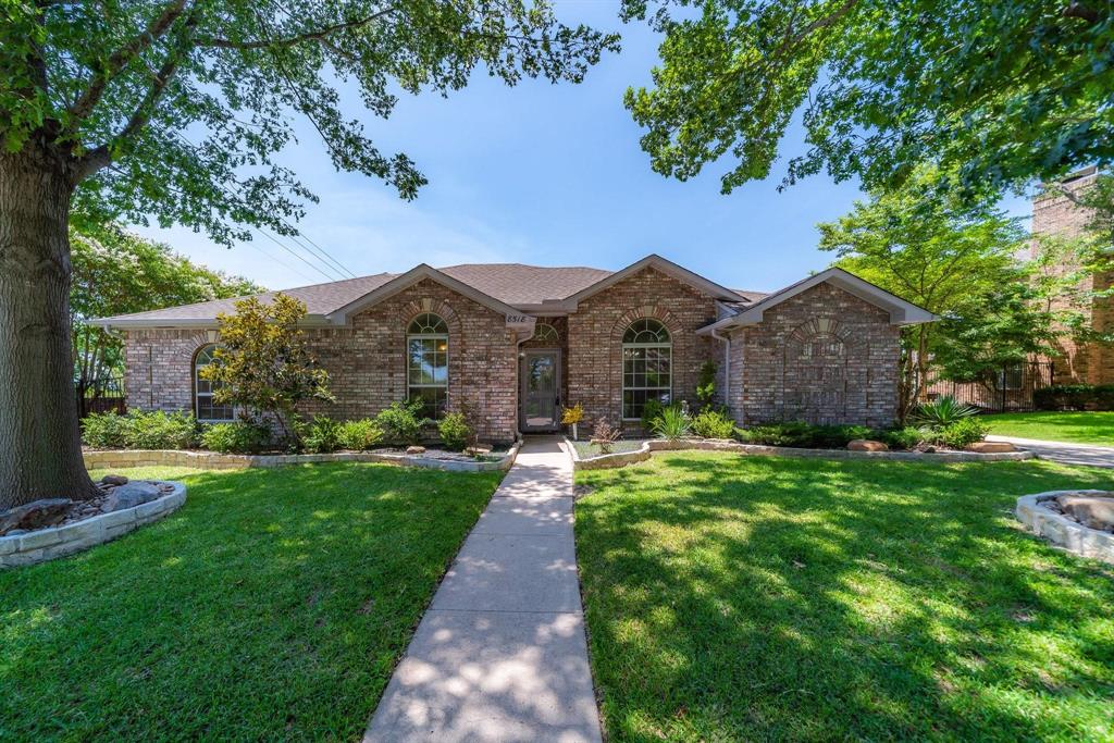 BACK ON MARKET. NO FAULT OF SELLER! Enjoy low energy costs with brand-new solar panels—April’s electric bill was under $20! This beautifully renovated luxe kitchen is designed for entertaining, featuring modern finishes and thoughtful details throughout. Nestled in a highly sought-after neighborhood with views of Lake Ray Hubbard, this home offers both tranquility and convenience, with easy access to major thoroughfares and no HOA. The property boasts impressive curb appeal, established landscaping, and a greenbelt backdrop with walking paths. Inside, an expansive floor plan provides flexibility with two spacious living areas and two dining spaces, perfect for any lifestyle. Enjoy the bonus room connected to the master suite, offering serene lake views and abundant natural light. The split floor plan ensures privacy, while fresh paint, new windows, and quality built-ins enhance comfort and value. 
This is a lovely home in a stellar location—move-in ready with room to add your own personal touches!