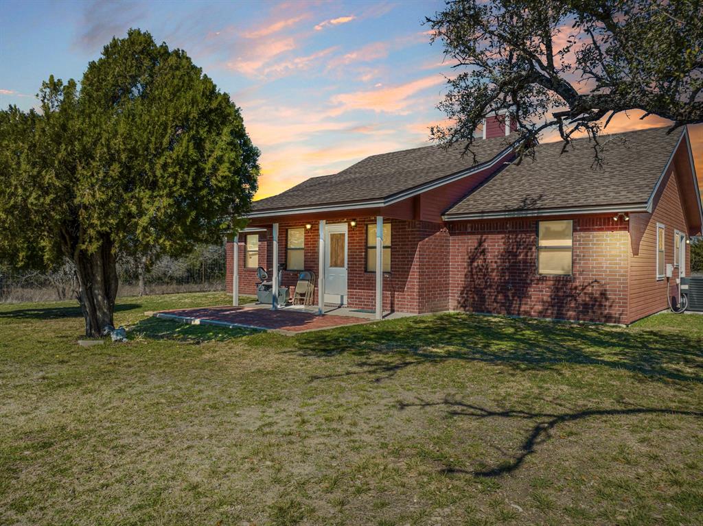 620± acre ranch located in the heart of Central Texas offering live water, diverse terrain, and a comfortable home. This property is part of a larger 1,200-acre game-fenced ranch, and approximately 620 acres are being offered for sale. A game fence will need to be installed along the western boundary.
The property includes a 3-bedroom, 2-bath home with a fireplace, ceramic tile floors, office-den, and a covered outdoor cooking patio. A 38’ x 25’ Quonset hut building provides storage or workshop space.
Water features are a highlight of this ranch. There are two lakes—one approximately 10 acres and the other just under 5 acres—along with three additional stock tanks. Bee Creek runs through the property for nearly 8,500 feet, featuring dramatic 20–40 ft limestone bluffs. These natural water sources create excellent fishing, wildlife, and livestock opportunities.
The land has rolling terrain with good tree cover, and elevations range from 1,020 ft to 1,100 ft above sea level. The ranch is well set up for hunting with seven established food plots, each equipped with feeders and blinds that will convey with the property. Native wildlife is abundant, including whitetail deer and turkey.
This ranch offers a great balance of recreational appeal and ranching use, with the scenic Bee Creek bluffs and lakes providing a true centerpiece. The home and outbuildings make it ready for use as a weekend retreat, hunting property, or permanent residence.
Centrally located in Central Texas—just 30 minutes from Gatesville and Lampasas, about an hour from Temple, Waco, and Killeen, and 1.5 hours from Austin. This is a rare opportunity to own a sizeable ranch with live water, lakes, and a home already in place in a prime location.