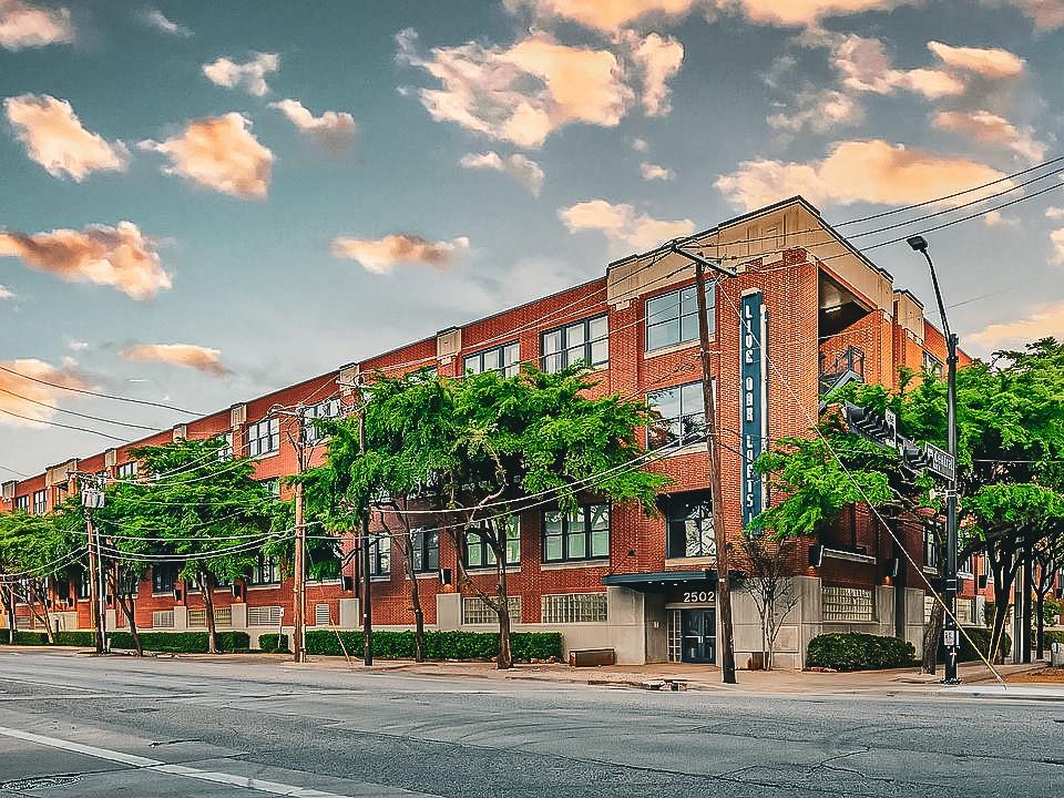 Welcome to your new home at Live Oak Lofts! This is an exceptional opportunity to live, work, and play in the heart of one of Dallas's most vibrant urban communities.

This stylish loft features an open-concept design with soaring 10-foot ceilings and expansive windows that showcase stunning views of the Dallas skyline by day and the city's dazzling lights by night. Warm terra-cotta floors add character and brightness throughout the space, while exposed ductwork enhances the loft's distinctive urban-chic appeal.

Recent updates include a new garbage disposal and toilet, providing added convenience and peace of mind. All appliances are included with the sale, and the sheer drapes will remain with the unit as well.

The bathroom has been thoughtfully remodeled by the owner and features a spacious, comfortable walk-in shower located just beyond the walk-in closet.

Residents enjoy access to outstanding community amenities, including a resort-style pool, fitness center, secure gated entry, and a controlled-access parking garage. This unit includes one assigned parking space.

Conveniently located with easy access to I-345, I-45, Main Street, and US Highway 75, this property places you just moments from Downtown Dallas, Deep Ellum, DART rail and bus service, Tom Thumb, and an endless variety of restaurants, coffee shops, entertainment venues, and nightlife destinations.

Whether you're building your career, embracing an active lifestyle, or simply looking for the perfect blend of convenience and excitement, Live Oak Lofts offers the ideal urban living experience.