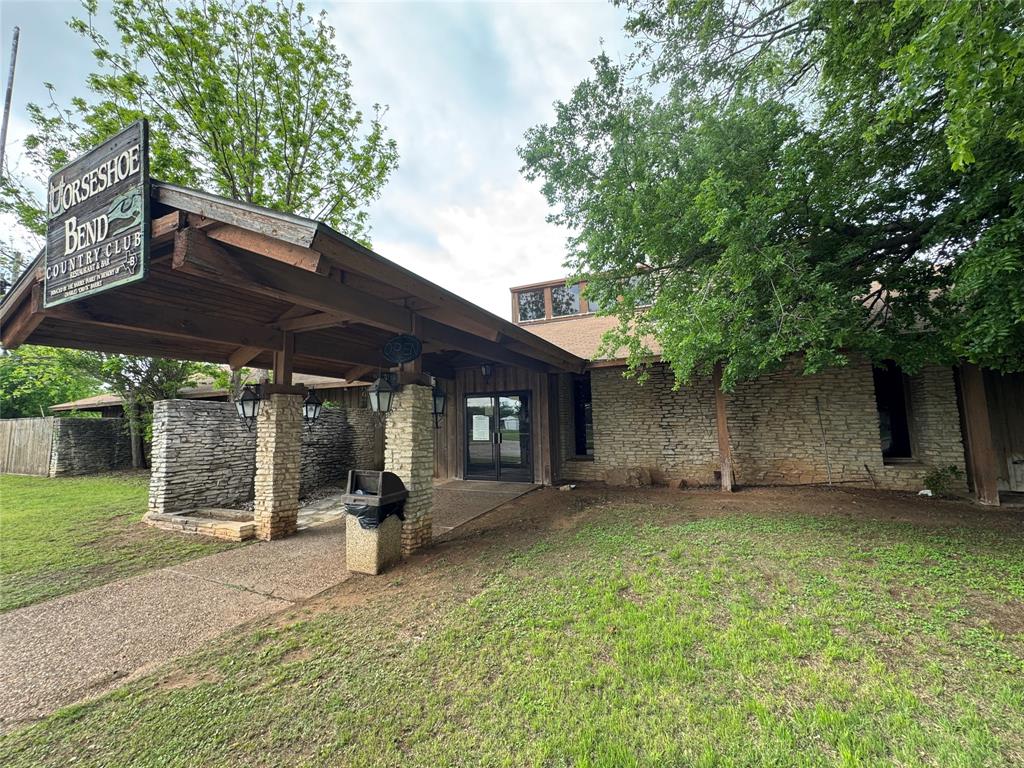 Incredible opportunity to own a 62+ acre golf course property anchored by a spacious clubhouse that is ready for a new transformation. Originally built in 1972, and recently used as a filming site for several of Taylor Sheridan's films. This clubhouse features grand ceilings, with large wooden beams, a massive fireplace, two office spaces, multiple bathrooms, large restaurant space that could offer the perfect foundation for a renovated event venue, revitalized as a restaurant, or easily be used as a massive dance floor space to expand as a night club. Plus a large community pool that is not currently in use. 

The property includes a 9-hole golf course, 12 operational golf carts, and all existing equipment, making it ideal for continued golf operations for its current members. 

Additional features include old tennis courts that are ready for a revamp, a secondary community pool and center that is located on the back side of the course. This could also be used to create an additional rentable space or to add more amenities for your guests. There are several working water wells on the property which means no water bill, and an additional well located directly under the windmill at the community center. 

With expansive acreage and a versatile layout, this property offers outstanding potential for a wedding venue, private club, resort-style destination, or mixed-use development.