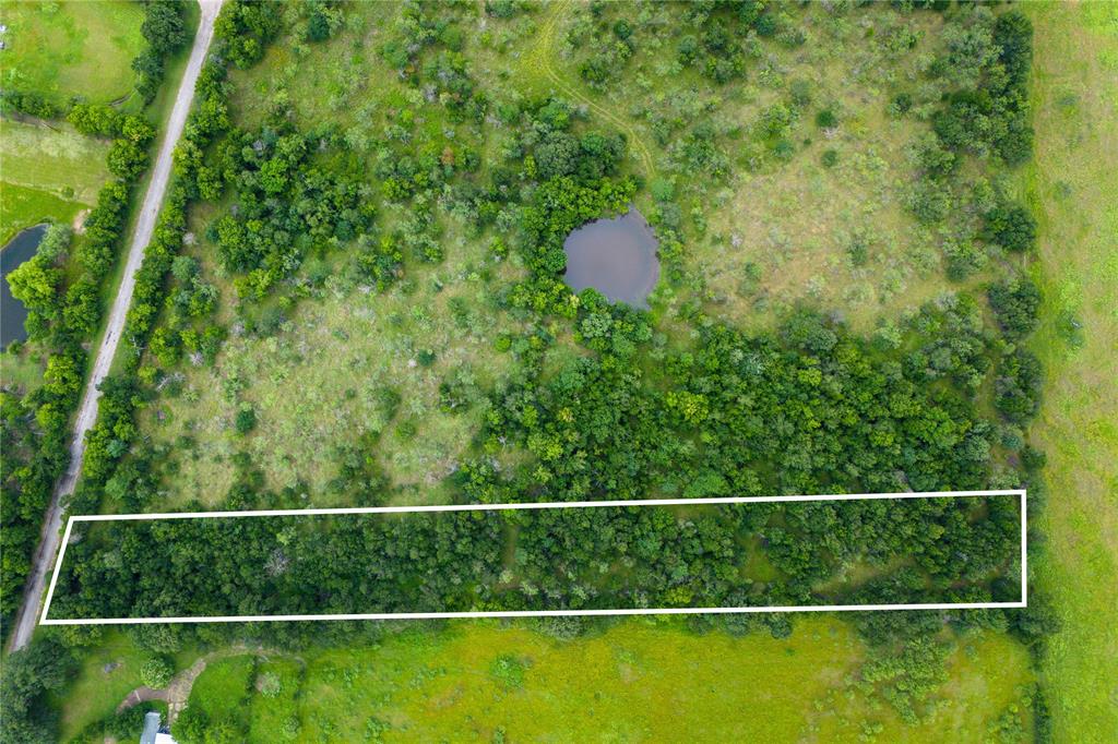 These lots have NO RESTRICTIONS – bring your mobile home, barndominium, or custom build! These are the lots you've been looking for that are just a stone's throw away from Legion Field (Marlin ISD Stadium), and less than a mile from Walmart and Marlin High School. You're just 25 minutes to Waco and 35 minutes from Temple, located incredibly close to both Highway 6 and Highway 7 for easy commuting. SELLER FINANCING OFFERED!

Each tract offers an incredible variety of mature trees, with some lots featuring pond access or existing improvements. You might be looking for a weekend getaway, a peaceful homestead in the country, or a great investment - let these tracts check your boxes.

Don’t miss out – schedule your visit today and claim your piece of unrestricted Texas land!

Photos for this listing are representative of the entire 30-acre site and not of the specific lot listed for sale. Boundary lines shown are approximate.