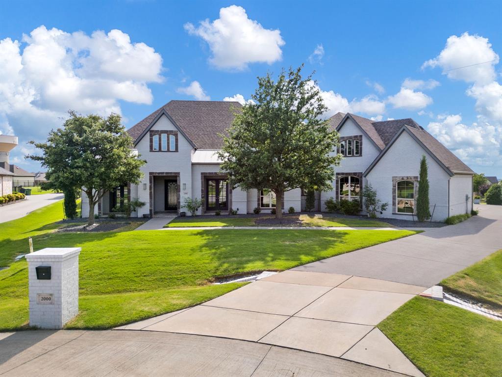Welcome to this exceptional Prosper luxury estate by Dave R. Williams Custom Homes, where timeless craftsmanship meets resort-style living. Perfectly positioned on a premium corner cul-de-sac lot, this stunning one-story home offers an ideal blend of elegance, comfort, and functionality. Designed with privacy in mind, each generously sized bedroom features its own ensuite bath, while the secluded primary retreat offers a true sanctuary with separate his-and-hers closets and spa-inspired comfort.

Built for both entertaining and everyday living, the expansive floor plan is filled with natural light and enhanced by thoughtful upgrades throughout, including spray foam insulation, abundant storage, two spacious pantries, and a rare Texas basement located above the oversized 4-car garage. Step outside to your private backyard paradise featuring a sparkling pool and spa, private pickleball court, putting green, and low-maintenance turfed yard designed for year-round enjoyment. This extraordinary property delivers luxury, recreation, and exceptional craftsmanship in one unforgettable Prosper home.
