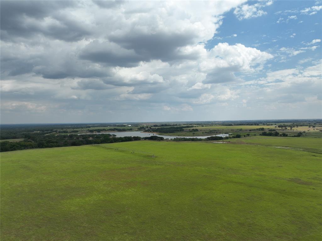 Cattlemen check this out!! 522 acres of good deep Coastal Bermuda grass along with some improved pasture. Included are 3 center pivots which can water approximately 150 acres. New fences surround the property with new cross fencing dividing up into several pastures. Very nice set of good pipe working pens to work your cattle. 4 good stock tanks for livestock are scattered across the property for ample stock water along with 2 water wells. Easy access from CR 150 or CR 144. If you need a place to run a bunch of cows this is it! Don't hesitate call today.