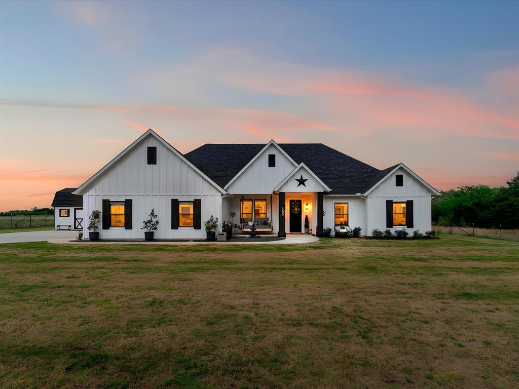 Tucked away on a full acre, this like-new home offers the perfect blend of privacy, functionality, and modern upgrades—just 3 minutes from the highway for ultimate convenience. The fully fenced lot with a gated driveway provides added security and peace of mind, while the charming front porch—complete with an oversized porch swing—invites you to relax and enjoy the quiet surroundings.

Inside, the home feels fresh and move-in ready, featuring 4 spacious bedrooms and 2 full bathrooms—both upgraded with bidets for an added touch of luxury. The kitchen is designed for both everyday living and entertaining, highlighted by an oversized breakfast bar that anchors the space and adds ample storage space with cabinets on front and back.

Step outside to your extended concrete back porch and enjoy a true backyard retreat. The outdoor living space is ideal for relaxing evenings, complete with breathtaking sunset views and fruit bearing trees that add both beauty and function to the landscape. The oversized back patio is also fenced, offering a perfect space for pets or kids.

This property is packed with thoughtful upgrades, including automatic remote-controlled shades, a pea gravel parking pad, and a large 20x12 storage shed that perfectly matches the exterior of the home. The garage features an incredible built-in storage system with floor to ceiling cabinets lining the walls, keeping everything organized and out of sight.

If you’ve been looking for space, style, and modern comfort—all in a peaceful setting with easy access to town—this one checks every box.