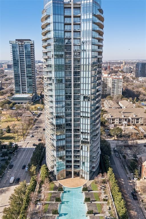 Appointment required - tenant occupied. One of Dallas’ most iconic luxury towers, this polished 952 SF residence at the Azure delivers boutique hotel energy with smart-home convenience and jaw-dropping skyline views. Bright, open living spaces are wrapped in floor-to-ceiling glass, flowing seamlessly to a private terrace with gas fireplace - an unbeatable spot for golden-hour cocktails or cozy evenings overlooking the city. The sleek gourmet kitchen is built to impress with Miele appliances, Sub-Zero refrigerator, custom cabinetry, and stone surfaces that double as casual dining. The tranquil ensuite bedroom features a generous walk-in closet and spa-caliber bath with dual sinks, deep soaking tub, and frameless glass shower. A chic powder bath and private laundry closet add everyday ease. Beyond the home, the Azure is legendary for its amenities: resort-style pool and spa deck, cutting-edge fitness center, theater, club and conference rooms, grilling terraces, and luxe outdoor lounges - all complemented by 24-7 concierge and valet. Private garage parking and storage convey. Ideal location on the edge of dowtown with immediate access to the Tollway. Walk to downtown, Uptown, the Katy Trail and more. Effortless lock and go, high-rise living in one of Dallas’ most coveted addresses.