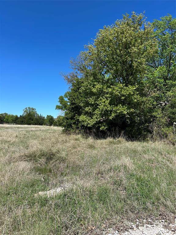 Bring your new home vision to life on this 2.2 acre lot with this experienced home building team who is ready to help you design and create your perfect custom home tailored to your lifestyle. Nestled on a meadow and framed in the back by mature oak trees, you can create your own personalized Hobby Farm or Recreational Retreat.  Located just minutes from local schools, shopping and easy access to Highway 287, you will enjoy the best of both worlds: a quiet country setting with quick connections to everything you need.  Other lots available.