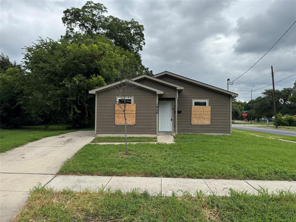This 3-bedroom home sits on a corner lot and offers a blank canvas for those looking to bring their vision to life.  The home features a functional floor plan with living area off the entry, galley kitchen, three bedrooms, two full bathrooms, and utility room with washer & dryer hookups. Nice size backyard with some trees. Open parking in driveway or on street available. Conveniently located in South Dallas- minutes from Fair Park and all that downtown has to offer! Bring your contractor, imagination, and vision to unlock the potential of this property.