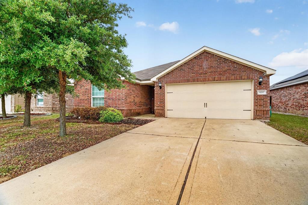 Welcome home to this beautifully well maintained 4 bedroom, 2 bathroom home located in the highly sought after Eagle Mountain-Saginaw ISD! Built in 2015, this 1,658 sq. ft home offers a spacious open concept layout perfect for entertaining and everyday living. The kitchen features granite countertops, plenty of cabinet space, and flows seamlessly into the dining and living areas, creating the perfect gathering space for family and friends. The split bedroom floorplan provides added privacy, with a generously sized primary suite tucked away from the secondary bedrooms. Step outside to enjoy the extended backyard patio, ideal for relaxing or hosting guests year round. Conveniently located close to shopping, dining, and entertainment, this home offers both comfort and accessibility in a growing area. Whether you’re looking for functionality, style, or a great location, this home checks all the boxes! Schedule your showing today and make this lovely home yours.