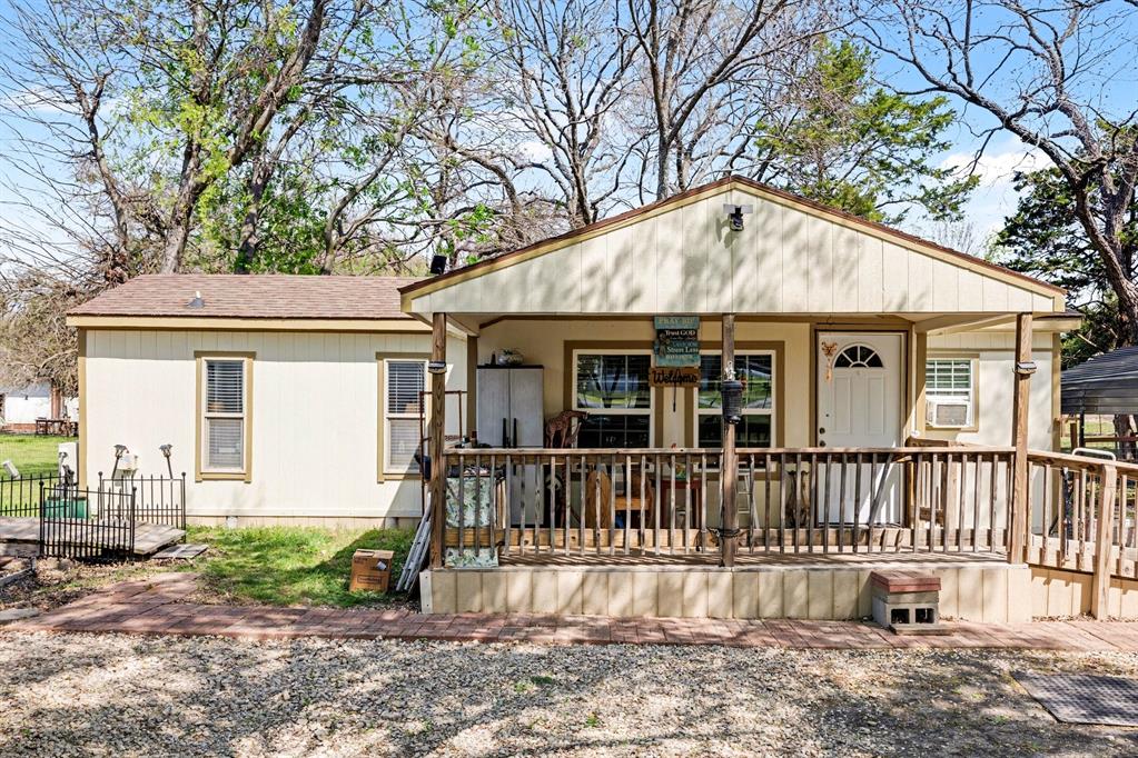 Unique Opportunity on a Rare Double Lot with Expansion Potential!
Tucked away in a private, quiet setting, this cozy retreat offers the perfect blend of peaceful living and smart design. Enjoy relaxing mornings on the covered porch overlooking the spacious property.
Inside, the open-concept floor plan is thoughtfully designed to maximize every inch and was remodeled in 2023, featuring a bright and inviting living space, a dedicated office, and a private bedroom with an ensuite bath. An additional half bath adds convenience for guests. The roof is approximately 3 years old, offering added peace of mind.
The oversized double lot offers incredible flexibility, including RV hookups and the opportunity to add a second residence, whether a mobile home, tiny home, or guest house, making it ideal for multi-generational living, rental income, or future expansion.
Outside, you’ll find a carport, a partially fenced yard with a dog run, and a storage building, providing both functionality and room to grow.
Whether you're looking for a serene getaway, an income-producing opportunity, or a property with future potential, this unique home is full of charm and possibilities.