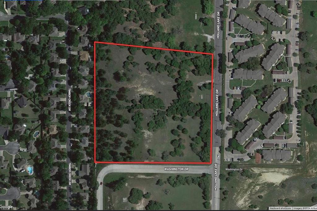 COMMERCIAL LAND FOR SALE!  9.609 Acres for commercial development.  Approximately 603' of road frontage on Holland Lake Dr.  Great exposure. Quick access to I-20.