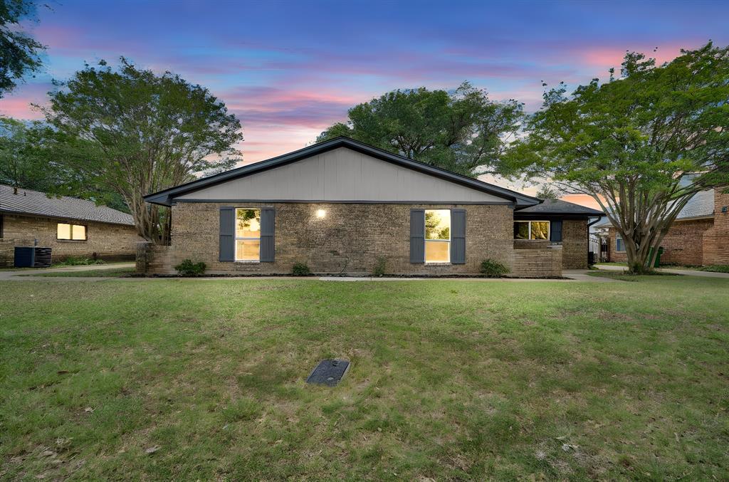 Beautifully renovated home in the established Waxahachie Country Club neighborhood with no HOA and golf course access. Situated across the street  from the golf course, this home offers a desirable setting just minutes from Waxahachie conveniences, I-35, and Hwy 287. Taken down to the studs and renovated from top to bottom, updates include new electrical, plumbing, roof, windows, doors, water heater, LVP flooring, interior paint, HVAC replaced in 2017. Light and bright interior features recessed lighting, shiplap accents, built-ins, wood-burning fireplace, granite countertops in kitchen and baths, white soft-close cabinets and drawers, and Kohler sinks. All bedrooms include walk-in closets and ceiling fans. Enjoy a massive shaded back patio in your private backyard under a massive shade tree. Long driveway and painted garage floor. Priced to sell!
