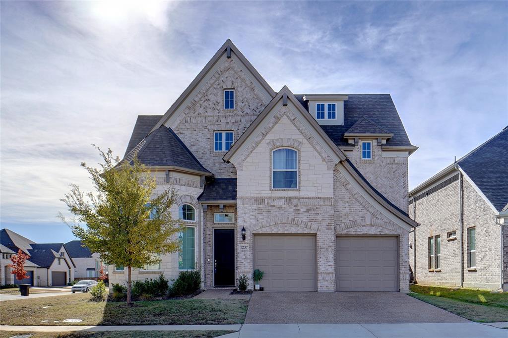 Experience elevated living in this stunning Grand Homes Marquise Plan, built in 2022 and proudly offered by the original owner. This impressive two-story residence blends modern luxury, thoughtful design, and generous living space—perfect for buyers seeking comfort, style, and functionality.

From the moment you enter, you’ll appreciate the grand layout featuring formal living and formal dining areas, ideal for entertaining, along with a spacious family room designed for everyday living. The chef-inspired kitchen is beautifully appointed with 42-inch custom cabinetry, a sought-after farmhouse sink, single wall oven, and electric cooktop, creating the perfect centerpiece for gatherings.

The highly desirable floor plan offers a private primary suite on the first floor, complete with spa-like comfort and expansive walk-in closets. A rare bonus is the secondary bedroom downstairs, ideal for guests, multigenerational living, or a private office. With two full bathrooms on the main level, convenience is built in.

Upstairs, entertainment takes center stage with two spacious game rooms plus a dedicated media room, offering endless possibilities for movie nights, recreation, fitness, or work-from-home flexibility. Additional bedrooms feature generous sizes and excellent storage throughout.

Built with the quality craftsmanship buyers expect from Grand Homes, this exceptional property combines elegance, space, and versatility in one remarkable package. Homes with this floor plan and premium features do not last long—schedule your private showing today before this opportunity is gone!