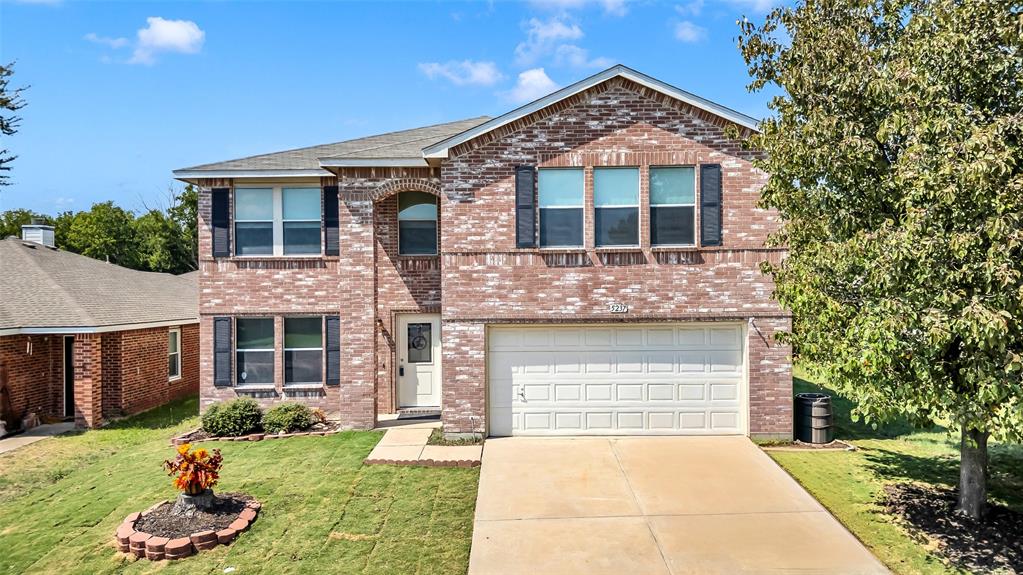 Discover incredible value in this sprawling 5-bedroom, 3-bath home, perfectly positioned just minutes from Marine Creek Lake. Offering a rare, flexible layout that includes dual primary suites—one on each level—this home provides the space and versatility typically found at a much higher price point. The heart of the home is well-equipped with granite countertops, stainless appliances, freestanding double convection oven, and abundant cabinet storage, including a large walk-in pantry plus an additional hallway pantry. Downstairs features a convenient private suite with a walk-in shower and accessible finishes. Upstairs a massive secondary suite highlighted by a soaking tub, separate shower, and two oversized walk-in closets. With space for everyone, having multiple living areas, a woodburning brick fireplace, an open desk nook, and walk-in closets in nearly every bedroom, there is room for everyone to spread out and have privacy! Rest easy knowing the major components have been addressed, allowing you to move in with confidence, HVAC Systems replaced in 2021, Water Heaters replaced in 2021 and 2023, Exterior new front and back doors installed in 2024. Located in a prime spot near shopping, dining, medical care, and higher education, this home makes daily life simple.Rarely do you find this much square footage and flexibility at this value. Schedule your private showing today!