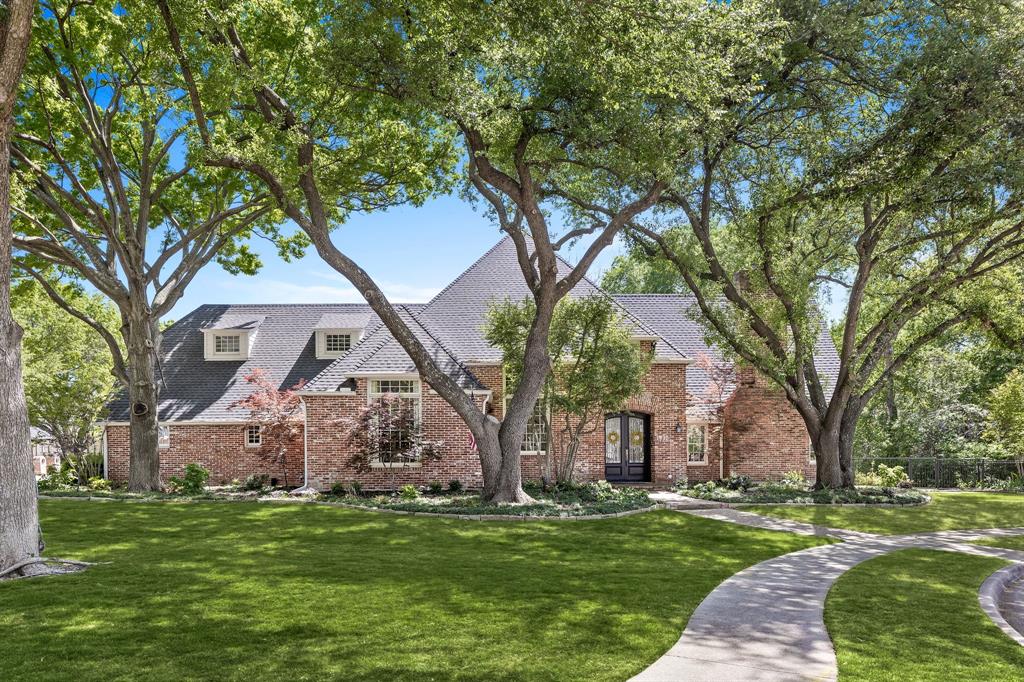 Exquisite cul-de-sac corner lot in The Estates of Gleneagles that will blow you away with all the luxury features and updates! Formal living boasts vaulted ceilings, walls of windows, built-ins, elegant marble fireplace, and convenient patio access. Airy dining room offers stylish chandelier and dramatic vaulted ceilings for extra ambiance. Spacious family room is illuminated with walls of windows overlooking backyard oasis. Easy flow to kitchen makes for easy entertaining. Chic gourmet kitchen features generous marble countertop space, and enormous waterfall island that boasts 6-burner GE Monogram cooktop with griddle. Other amenities include built-ins, double ovens, warming drawer, Bosch dishwasher and SubZero refrigerator installed in 2024. Sunny breakfast nook features built-ins and stylish chandelier for warm atmosphere. Indulge in hotel-style living in primary suite featuring windows overlooking shimmering pool, doors to patio, and relaxing sitting area. Remote shades offer easy lighting and privacy options. Spa-like primary bath is true luxury, with heated marble flooring, dual vanities with abundant counter space, built-in beverage fridge, and oversized standing shower with bench, steam features, and dual heads. Walk-in closet also has heated flooring, built-ins, and cedar closet. Private upstairs study is split-level, creating natural sitting area with plenty of built-ins and windows. Additional bedrooms offer full baths, walk-in closets, and ample room for families. Rooms could be used as exercise space or additional study. Impressive backyard oasis offers heated diving pool, travertine deck, cozy firepit, and extra green space for play yard or putting green. Covered cabana is ideal for outdoor dining with built-in gas grill, refrigerator, custom lighting, and A-V wiring for entertainment. Extra features include Control 4 Media-Smart Home System, oversized lot with creek, 2 tankless water heaters, driveway gate, lighting in trees, and generous storage.
