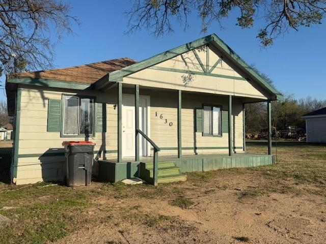 INVESTORS!  HOME BUYERS!  Take a look at this 3 bedroom, 1 full bath home in NE Paris located across from the Lamar County Fairgrounds.  With its cottage style architecture, this could be absolutely adorable with some minor updates.  Open living-dining combo.  Kitchen large enough to accommodate a dining table.  Bathroom is roomy with over size vanity.  Nice utility room with washer-dryer connections.  Central heat and air.  Recent new carpet.   LCAD square footage is incorrect.  Estimate is 1000 square feet.