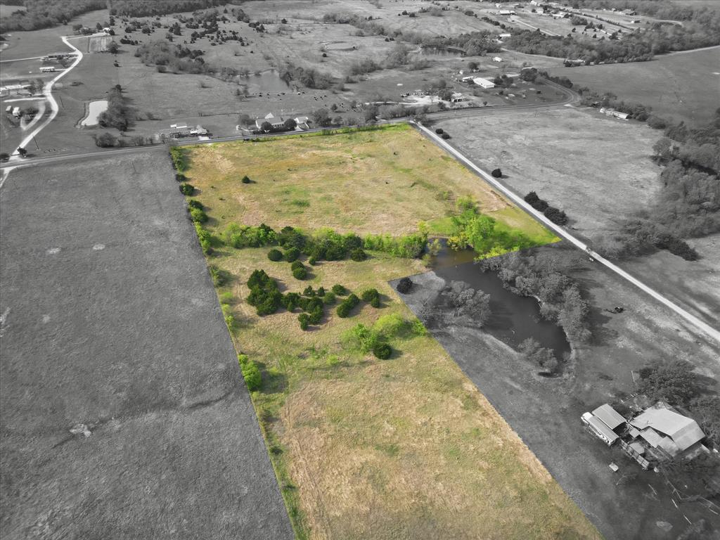 Discover the perfect blend of peaceful country living and future investment upside with this beautiful unimproved tract located just minutes from the path of growth. This property features a gently rolling hilltop with breathtaking views, offering an ideal homesite for those looking to build a private retreat.

A small pond adds charm and functionality, perfect for recreation, livestock, or simply enjoying the natural setting. While the property currently has no utilities installed, an electric pole is already located on-site, providing a strong starting point for future improvements.

Positioned approximately 3 miles west of the planned Outer Loop, this land sits directly in the path of anticipated development, making it an excellent opportunity for investors seeking long-term appreciation or a strategic flip as infrastructure expands outward.

Whether you're envisioning a family homestead, weekend getaway, or future development play, this property offers space, scenery, and upside potential in a rapidly growing area.