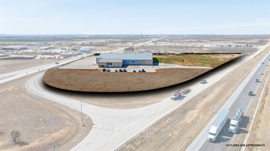 FOR SALE! Approximately 40,000 square foot building with tons of warehouse space & 3-Phase power, 5,776 sq.ft. of office space, four restrooms, a heated paint booth room on 7.6 fenced acres. There is a loading dock, asphalt parking lot and plenty of yard space for heavy equipment, materials or vehicle storage. This property is located between the busy I-20 Interstate & East HWY 80. Property uses could include industrial business, energy company, manufacturing, fabrication, warehousing or trucking.