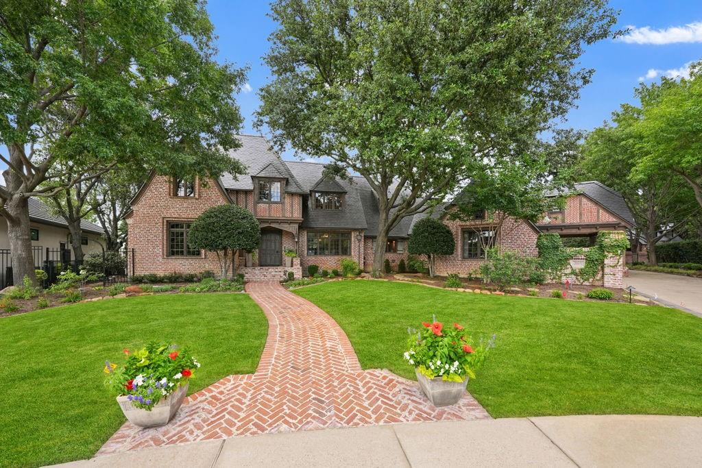 A rare opportunity to own one of the premier waterfront estates in the exclusive gated community of Lakes on Legacy. Situated on a private half-acre cul-de-sac lot with sweeping lake views, this custom Hawkins-Welwood residence spans three levels and showcases exceptional craftsmanship, timeless European-inspired architecture, and thoughtfully designed living spaces throughout. Built as the personal home of Curt Welwood, the property offers six bedrooms, five full baths, one half bath, four living areas, and a detached one-bedroom guest apartment complete with a living area and full bath, ideal for extended family, guests, or a private office. The kitchen was extensively remodeled in 2021 and features imported stone from Spain, custom cabinetry, expansive prep space, and seamless flow into the adjoining breakfast and living areas. Custom wood flooring imported from England, five fireplaces—including three imported from English country manors—exposed beams, rich millwork, and abundant natural light create an atmosphere of warmth and sophistication throughout the home. A walk-out basement provides exceptional living and entertaining space, complete with a temperature-controlled wine cellar. A dedicated study with hidden storage, spacious upstairs media room, and multiple gathering areas throughout the home offer flexibility for everyday living. Designed to embrace its exceptional waterfront setting, the outdoor spaces include three patios, two with retractable screens, a sparkling pool and spa, mature trees, beautifully maintained landscaping, and multiple areas to relax while enjoying peaceful lake views. Located within Frisco ISD and just minutes from Legacy West, The Star, PGA Frisco, shopping, dining, and entertainment, this one-of-a-kind estate combines privacy, craftsmanship, and an unmatched setting in one of Frisco's most sought-after gated communities.