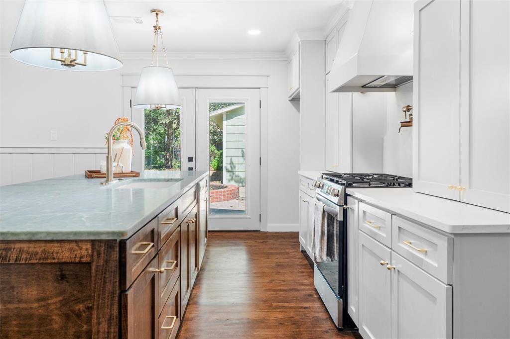 This charming 1940s home has been completely remodeled with all new modern amenities to complement the restored original hardwood flooring and front door. Everything is NEW — foundation, electrical, plumbing, windows, water heater, appliances, interior and exterior paint, cabinetry, countertops, and designer lighting, tile work, and moulding throughout. Outside, you’ll enjoy an oversized detached two-car garage, perfect for storage or a workshop. Conveniently located near Sylvania Park, the Historic Stockyards, downtown Fort Worth, and all major highways. Schedule your showing today and make this beautiful house your new home! OWNER FINANCING AVAILABLE. Typical structure includes ~20% down and ~10% interest, but all terms are negotiable.