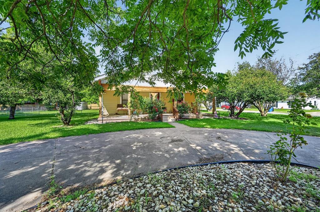 Built in 1905, this Ennis home offers a combination of character, functionality, and updates that are difficult to find in one property. With 3 bedrooms, 1 bathroom, and 1,968 square feet, there is plenty of room to enjoy both inside and out.

One of the standout features is the fully remodeled kitchen. Thoughtfully updated with abundant cabinet storage and generous countertop space, it provides the perfect setting for everything from everyday meals to holiday gatherings and entertaining guests.

The oversized utility room offers flexibility that today's buyers appreciate. In addition to serving as a laundry area, it provides ample space for storage, hobbies, crafts, a home office, or other creative uses.

Situated on just over half an acre, the fully fenced yard offers room for pets, gardening, outdoor activities, and future projects. The circular driveway adds convenience while creating a welcoming first impression from the moment you arrive.

The property is also equipped with solar panels, offering potential energy savings for the next owner. Buyer will need to assume the existing solar panel agreement.

If you're looking for a home with charm, space, and meaningful updates, this Ennis property deserves a place on your must-see list. From the remodeled kitchen to the spacious lot and historic character, this home offers a unique opportunity to enjoy the best of both old and new.