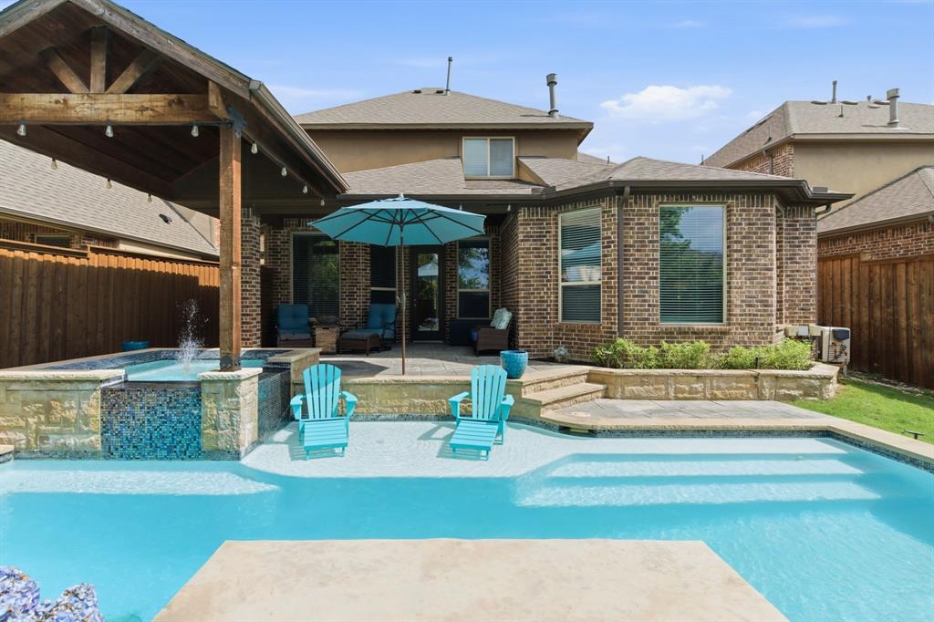 NOW OFFERED AT AN IMPROVED PRICE! 400 Ridgewood Dr in Highpoint Oaks Estates offers 5 bedrooms with the primary bedroom and ensuite bathroom downstairs, 4 full bathrooms, an open-concept floorplan, an upstairs game room, and a brand new pool with hot tub surrounded by an 8 foot board on board fence in a sought-after Lewisville location. This property also provides a unique school choice opportunity between Lewisville ISD and Coppell ISD.

Located in Lewisville, TX 75067, this spacious home is designed for both everyday living and entertaining. The open floorplan connects the main living areas, creating a seamless flow between the kitchen, dining, and living spaces. With five bedrooms and four full bathrooms, the layout offers flexibility for a variety of living arrangements, guest accommodations, home office needs, or multi-generational living.

Upstairs, the game room provides additional space for recreation, media, fitness, or work-from-home use. Outside, enjoy a brand new pool and hot tub, creating a private backyard retreat ideal for relaxation and entertaining year-round.

Situated in the Highpoint Oaks Estates community, this Lewisville home combines generous living space, modern outdoor amenities, and convenient access to major employment centers, shopping, dining, and transportation corridors throughout Denton County and the Dallas-Fort Worth Metroplex.

Property Highlights:

- 5 Bedrooms
- 4 Full Bathrooms
- Primary Suite Downstairs
- Open Floorplan
- Upstairs Game Room
- Pool
- Hot Tub
- 8 Foot Board on Board Privacy Fence
- Located in Highpoint Oaks Estates 
- Choice of Lewisville ISD or Coppell ISD Schools

For buyers searching for homes with a pool in Lewisville TX, 5-bedroom homes in Lewisville, homes near Coppell, or properties with school choice options in Denton County, 400 Ridgewood Dr presents a compelling opportunity.