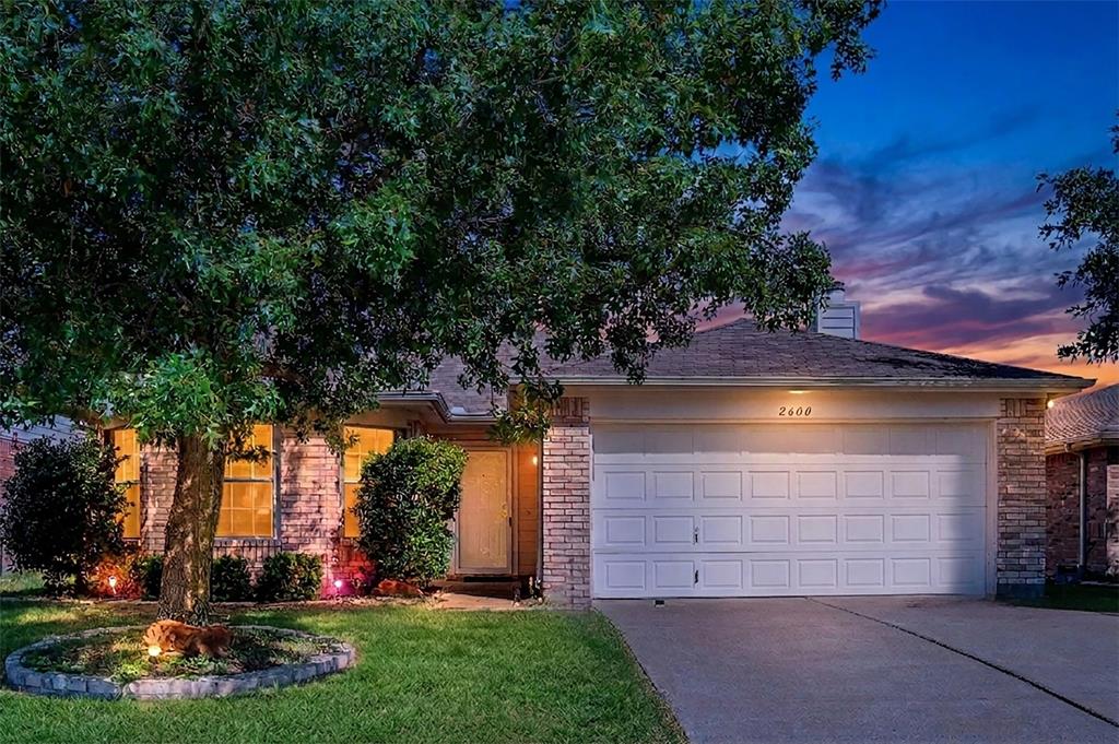 Welcome to this wonderful 3-bedroom, one-story home in a prime McKinney location! Nestled in a quiet neighborhood, this move-in-ready property is perfectly situated just minutes from US-75 and Highway 380, making your daily commute a breeze. Families will love the incredible convenience of being close to top-tier McKinney schools, a local elementary school, Collin College, and Charles McKissack Park, with endless shopping, dining, and entertainment options just around the corner.  Step inside to find a thoughtfully designed split floor plan that offers maximum privacy for the primary bedroom, which features a private bath and peaceful views of the spacious backyard. Designed for easy maintenance and modern appeal, the entire home features beautiful wood flooring and recently installed tile in the bathrooms—absolutely no carpet! The oversized living room serves as the heart of the home, boasting a warm brick fireplace that is perfect for cozy winter evenings. The large, open kitchen provides ample space for a sizable family dining table and flows effortlessly into a massive pantry and utility room combination. From the dining area, slide open the glass doors to access a spacious, sunny backyard that is perfect for kids, pets, and outdoor fun. This home has been meticulously updated so you can move right in with peace of mind. High-ticket updates include a recently replaced roof, an updated AC system, a water heater, and several replaced windows. Fresh paint spans throughout the entire interior—including the garage—and is beautifully complemented by updated light fixtures. Combining an unbeatable location with fantastic community amenities, this McKinney gem is the perfect place to call home!