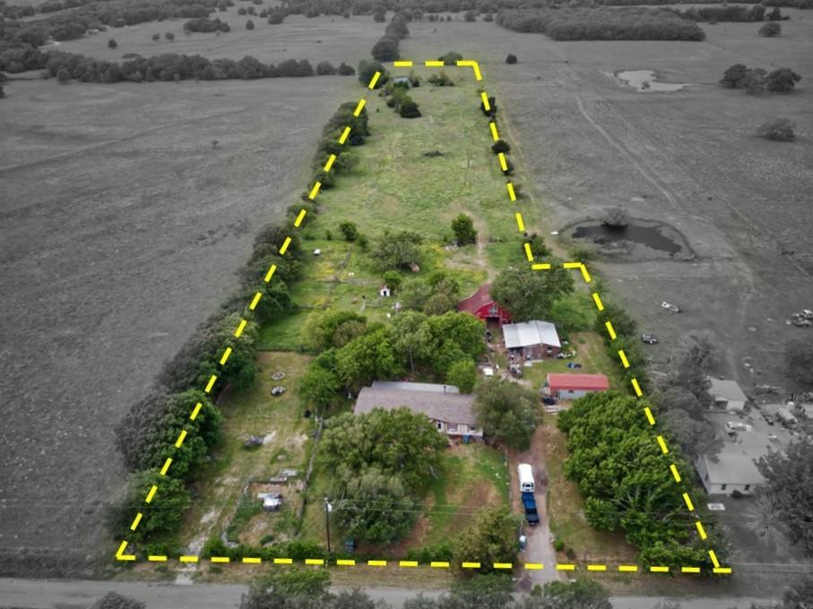 Situated on 8.8 acres in rural Hunt County, this property offers a unique opportunity for investors or buyers looking to create value through renovation. The 2,126 SF doublewide home is in poor condition and will require significant repairs, but the groundwork is in place for a rewarding project. Multiple barns and storage buildings provide added utility for agricultural, workshop, or equipment use. The land is fenced and cross-fenced, making it well-suited for livestock or rural living. Priced below assessed value and offered strictly as-is, this property presents strong upside potential for those ready to put in the work. 7.8 acres of the propert are Ag exempt, making the tax burden low. Located only 6 miles from the public Caddo Creek boat ramp on West Tawakoni Lake. 

Hunt County continues to see steady growth with a population exceeding 120,000 residents , while nearby Greenville, the county seat, has grown to over 37,000 residents with a median household income around $62,000 . Quinlan offers a smaller-town setting with a population of approximately 1,600 and a median household income near $44,500 . This combination of rural space and proximity to growing communities makes this property a compelling investment in a developing market.

Buyer and buyers agent to verify all measurements.